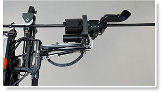 The robot moves to the wire stripping position